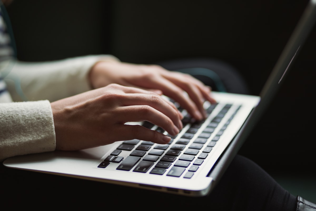 Person at a computer keyboard working through a problem